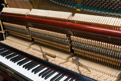 Vertical piano being regulated